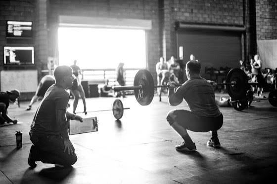 Trainer coaching client